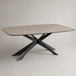 Masă de dining Vector cu blat ceramic gri și bază sculpturală în X, imagine principală generată