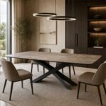 Masă de dining Vector cu blat ceramic gri și bază sculpturală în X, ambient de dining generat
