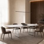Masă de dining Lucent cu blat ceramic și baze transparente, ambient de dining generat