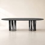 Masă de dining Cadenza cu blat oval și baze lamelare circulare, imagine principală generată