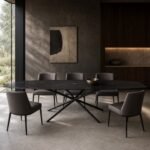 Masă de dining Aster cu blat negru și bază radială tubulară, ambient de dining generat