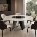 Masă de dining rotundă Vortex cu blat marmorat și picioare radiale, ambient de dining generat