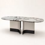 Masă de dining Lunaria cu blat oval marmorat și baze curbate bicolore, imagine principală generată