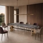 Masă de dining Reverso cu blat mineral segmentat și cadru portal din bronz, ambient de dining generat