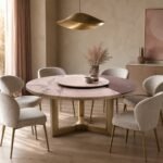 Masă de dining rotundă Rosetta cu blat mineral segmentat și bază tripodală din bronz, ambient de dining generat