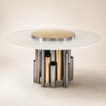 Masă de dining rotundă Carillon cu blat mineral perlat și soclu tubular bicolor, imagine principală generată