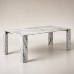Masă de dining Lithos cu structură monolitică din marmură albă – imagine principală generată
