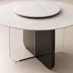 Detaliu generat al blatului mineral alb și soclului cruciform transparent-fumuriu