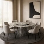Masă de dining rotundă Diamante cu blat mineral alb-negru și soclu fațetat oglindit – ambient de dining generat