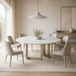 Masă de dining rotundă Quadratura cu blat mineral alb și soclu din rame champagne – ambient de dining generat