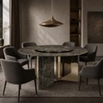 Masă de dining rotundă Regalia cu blat mineral negru și soclu radial bicolor – ambient de dining generat