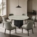 Masă de dining rotundă Celadon cu blat mineral stratificat și soclu negru fațetat – ambient de dining generat