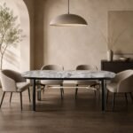 Masă de dining Arcadia cu blat mineral gri și structură tensionată champagne – ambient de dining generat