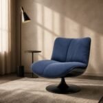 Fotoliu lounge pivotant Orbit cu bază tip lalea – ambient contemporan de lectură generat