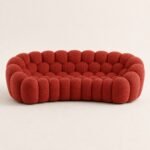 Canapea lounge curbată Cellula cu volume capitonate – imagine principală generată